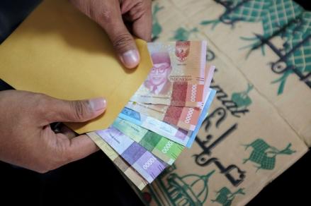 Berapa Potongan Tukar Uang di Pinggir Jalan untuk Lebaran? Ini Bocorannya?